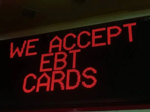 A sign that says we accept EBT cards