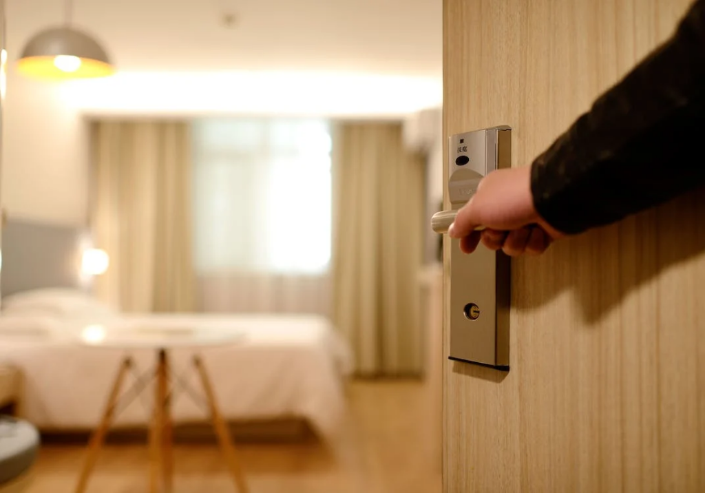A hotel room door opening